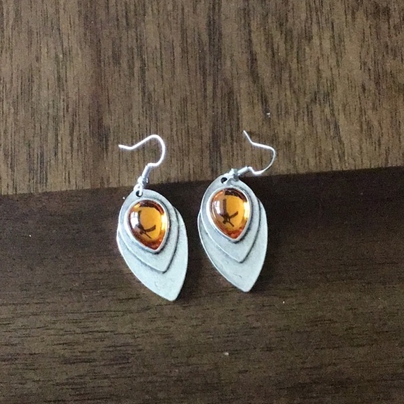 Jewelry - Silver in color dangle earrings new